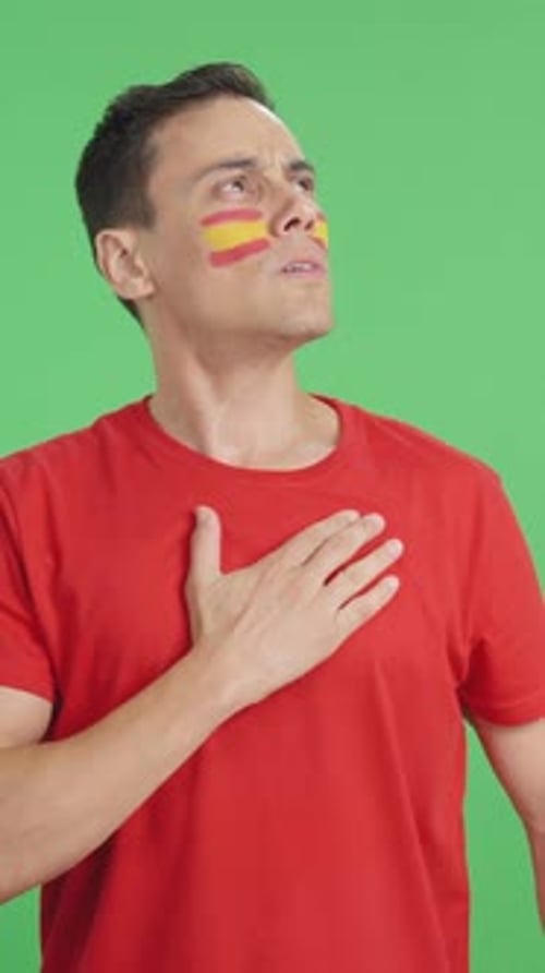 Man with Markings Hand Over Heart