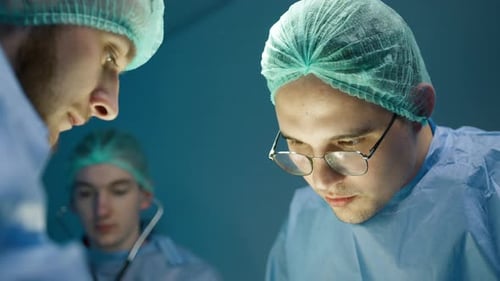 Close Up Portrait of Serious Focused Vet Doctor During Surgery Operation in Vet
