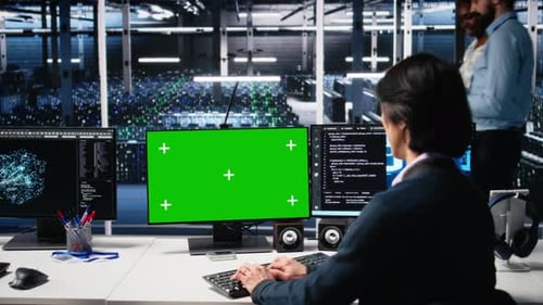 Data Center Admin Typing on Isolated Screen PC Keyboard Using AI