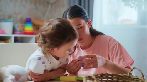 Mother and Child Crafting with Play Dough at Home