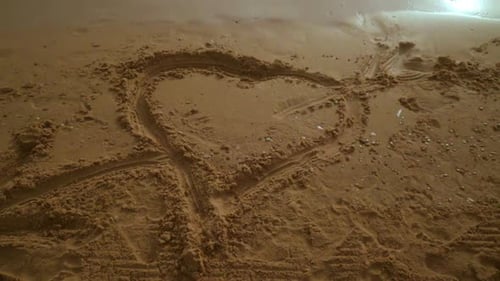 Panning From Heart Symbol on Sand to Seascape View. Sea Beach With
