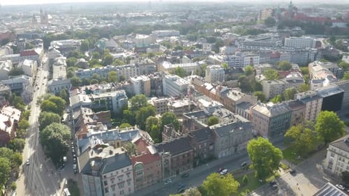 Aerial drone forward moving shot over old town of Krakow, Cracow, Poland, Polska on a bright sunny d
