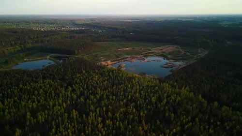 Serene Forest Landscape with Lakes Sunset and Tranquil Setting Captured From an Elevated Perspective