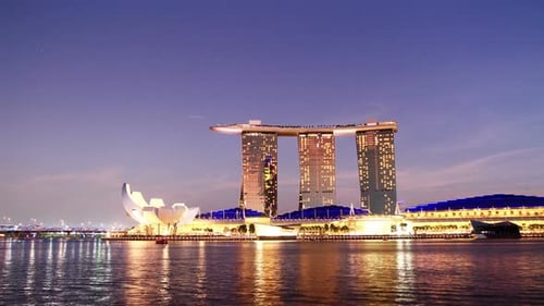 Singapore skyline time lapse at sunset on marina bay sands in january
