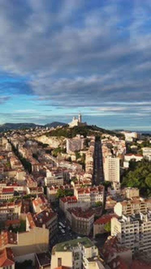 Drone View of the City of Marseille France at Sunrise NotreDame De La Garde