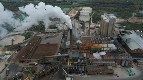 Aerial view of industrial complex with tanks, United Kingdom.