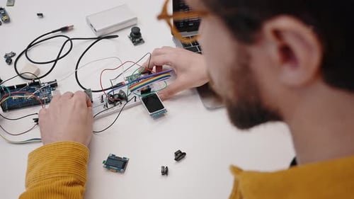 Engineer working with electronics and computer science