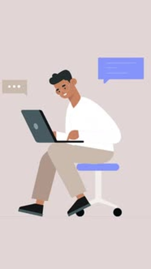 Männlicher Mitarbeiter, der im Büro arbeitet und an einem Projekt auf seinem Laptop Vertical arbeitet