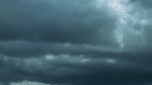 Majestic White Clouds Billowing Across a Turquoise Sky