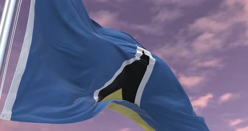 Realistic Saint Lucia Flag Waving Against Cloudy Sky