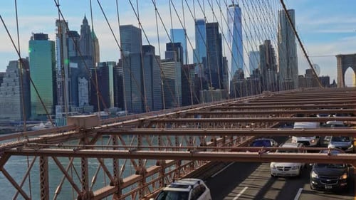 View from the Brooklyn Bridge to the road and skyscrapers of New York