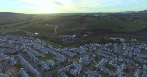 Aerial View of Suburban Neighborhood at Sunrise