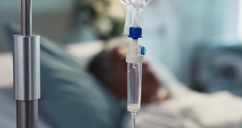 IV drip, health and medicine with patient in hospital, treatment and surgery with healing pr