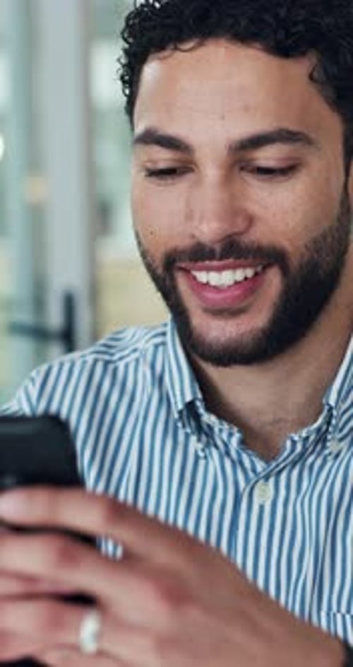 Business, man and typing with phone in office for email response, texting client