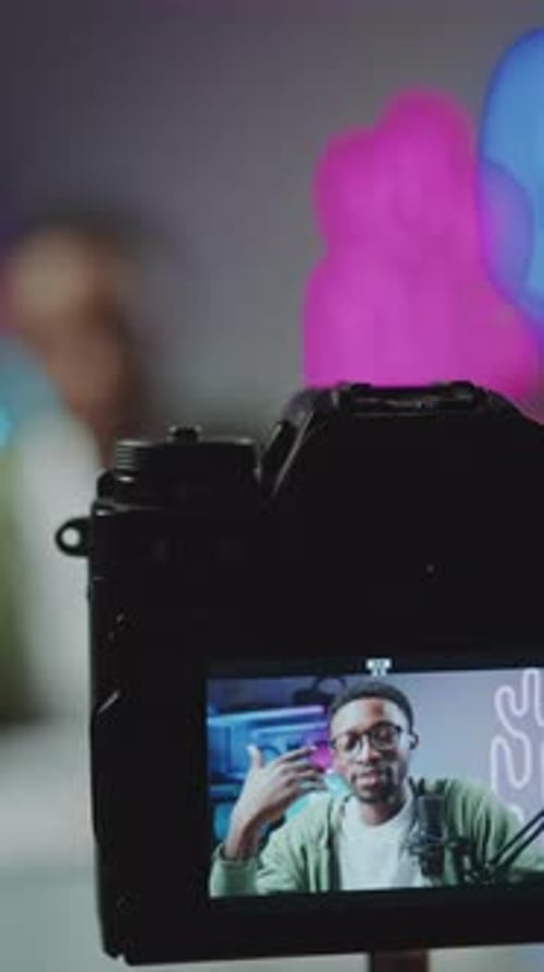 Digital Camera Recording Vlogger Talking in Studio