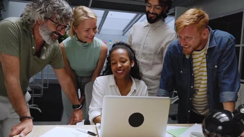 Group of Professional Multirracial Men and Women Working at the Office These Colleagues Look Happy