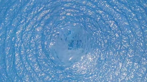 Aerial view of pool water rippling in slow motion