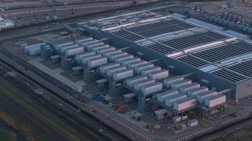 Aerial view of a modern hyperscale data center with solar panels