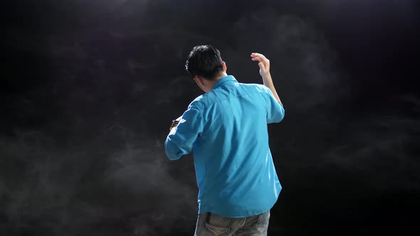 Back View Of A Man Rapping Into A Condenser Microphone On The White ...