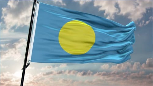 Waving Flag of Palau Against a Cloudy Sky