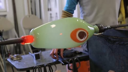 Glass Blowers Rolling and Shaping Hot Glass in Workshop 3034 Years