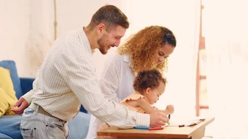 Happy Family Drawing Together at Home