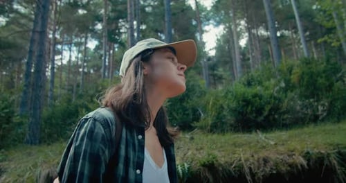 Woman Portrait Walk with Backpack in Woodland on Tourist Path Enjoy Nature