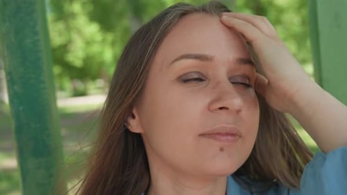 Pensive Lady Outdoors Contemplative Female Standing Beneath Shaded Trees in Park Girl with Gentle