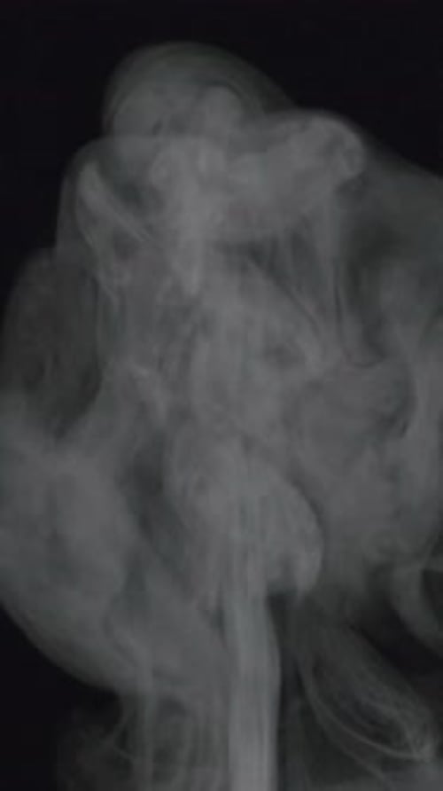 Rising White Smoke on Black Background
