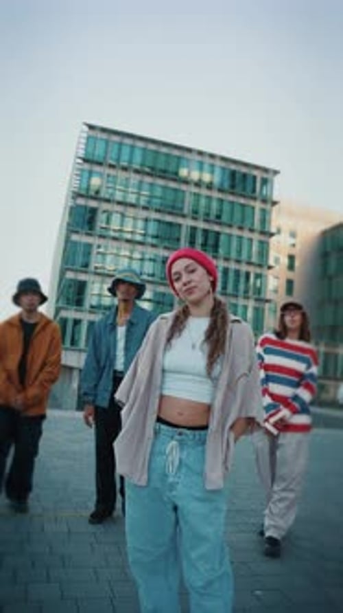 Urban Youth with Fierce Looks and Street Attitude Walk Toward the Camera with Swagger