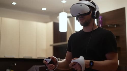 Man Experiences Immersive VR Gaming at Home