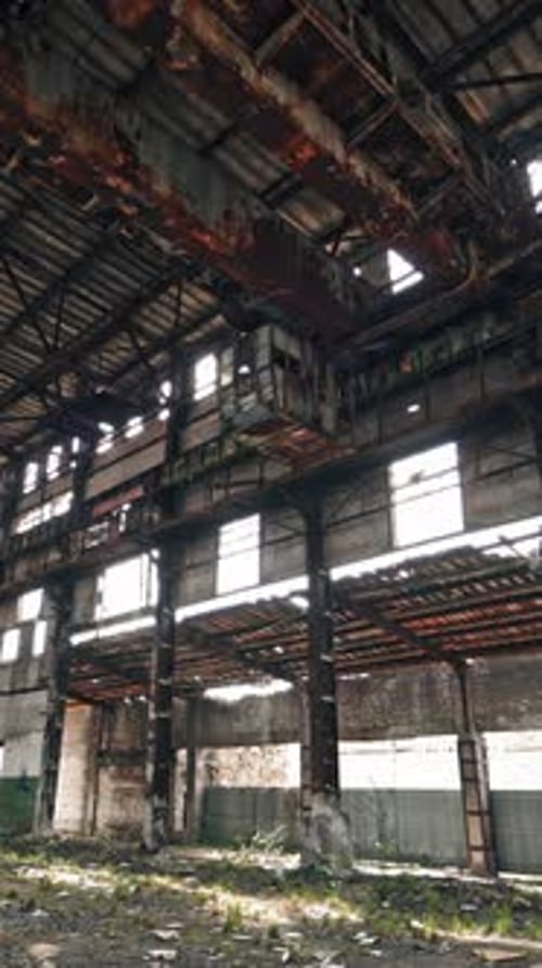 Abandoned ruined industrial factory building, ruins and demolition concept . Vertical video