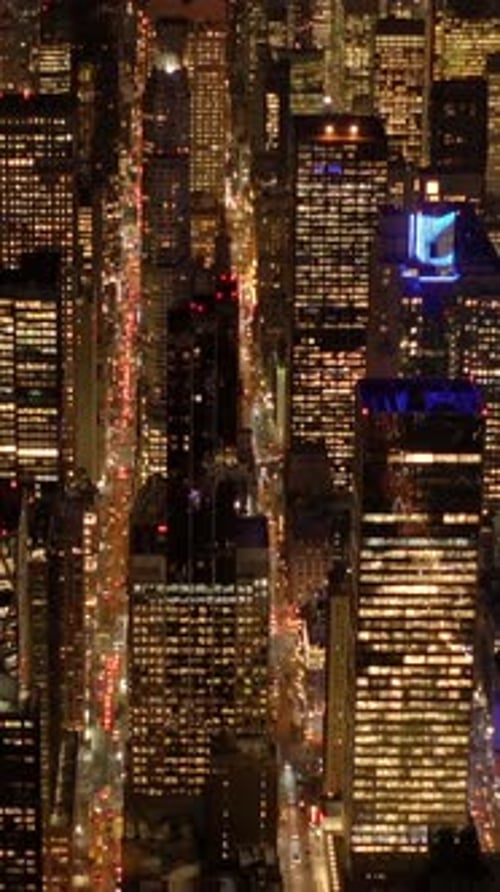The Vibrant and Colorful City Lights at Night in a Bustling Urban Landscape are Captivating