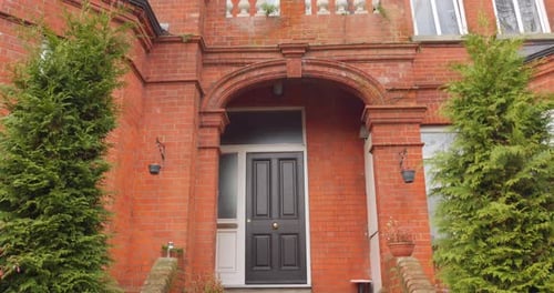 Typical Doorstep With Stone Brick Facade Architecture In Dublin Ireland. Tilt-down Shot