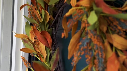 Festive Fall Wreath Hanging Near White Door