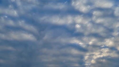 Billowing Clouds Time-Lapse in Blue Sky