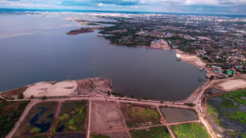 Grounds for Silt Manufacturing on Riverbank Aerial View