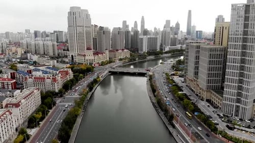 Aerial View of Tianjin Cityscape with Haihe River and Skyscrapers Stock Footage captures a