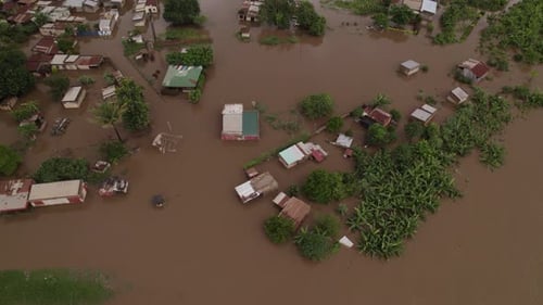 Aerial view of flooded houses and trees, Mozambique.