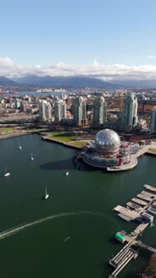 Science World Located On False Creek In Vancouver, Canada - Drone, Vertical Shot