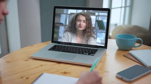 Woman On Computer Screen Talking to Someone