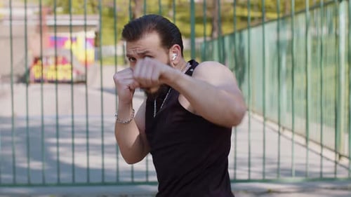 Athletic Lebanese Man in Sportswear Doing Sport Training Shadow Boxing Fitness Aerobics Cardio