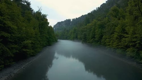 Aerial View river with a foggy mist in the background