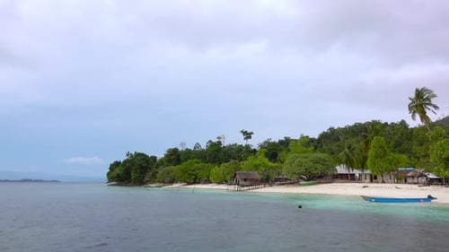 Village on the Shore of a Tropical Island