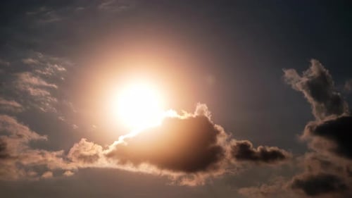 Glowing Sun Radiates Light Through the Sky