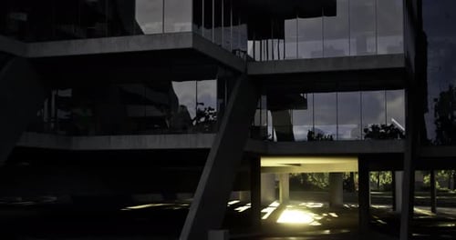 Estructura arquitectónica iluminada por una luz suave al anochecer