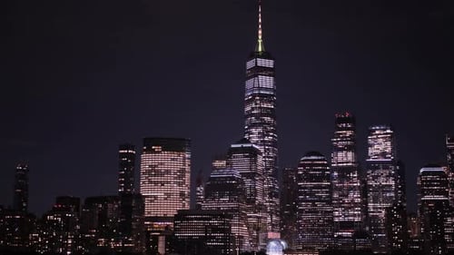 Experience the Stunning Night View of New York Citys Skyline Highlighted By the Freedom Tower