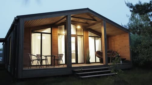 Cozy Wooden House at Nightfall