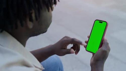 Man Tapping Lower Third of Phone Green Screen Mockup