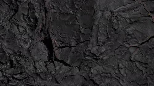 Volcanic lava rocks filled with sharp cracks and crevices.
Location: Big Island, Hawaii
4K Raw Aer